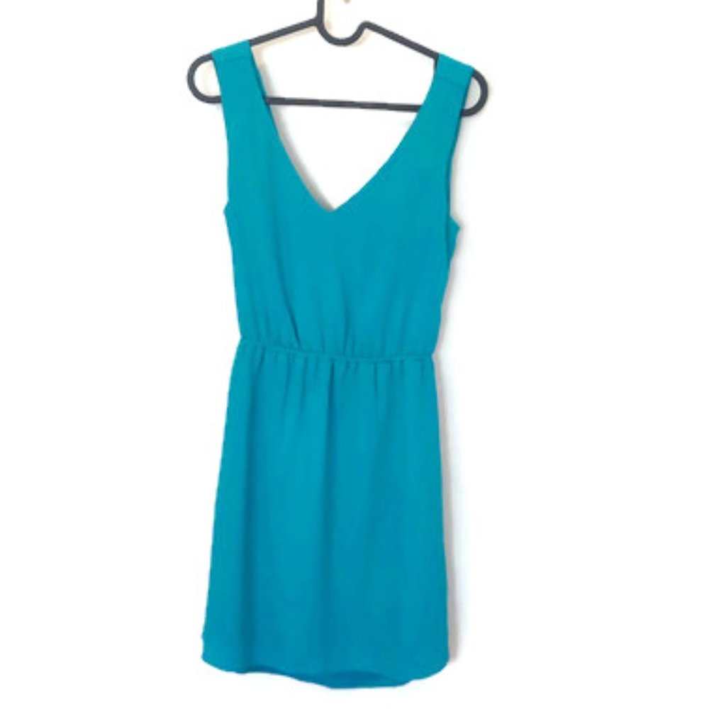 Cute teal dress with beautiful low back and V-neck